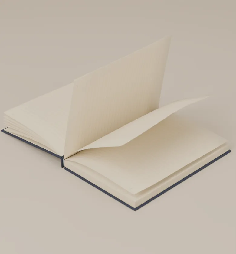 The Water notebook open, its pages turning